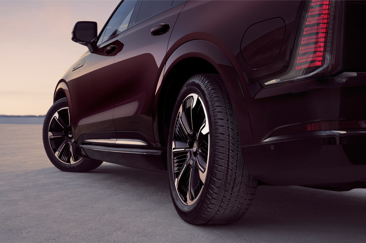 Lower Rear Side View of a Black Cadillac Vehicle Tires