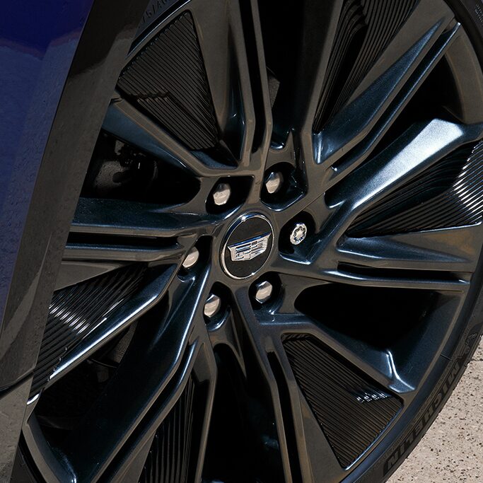 Close-up of a Cadillac Tire with the Emblem at the Center