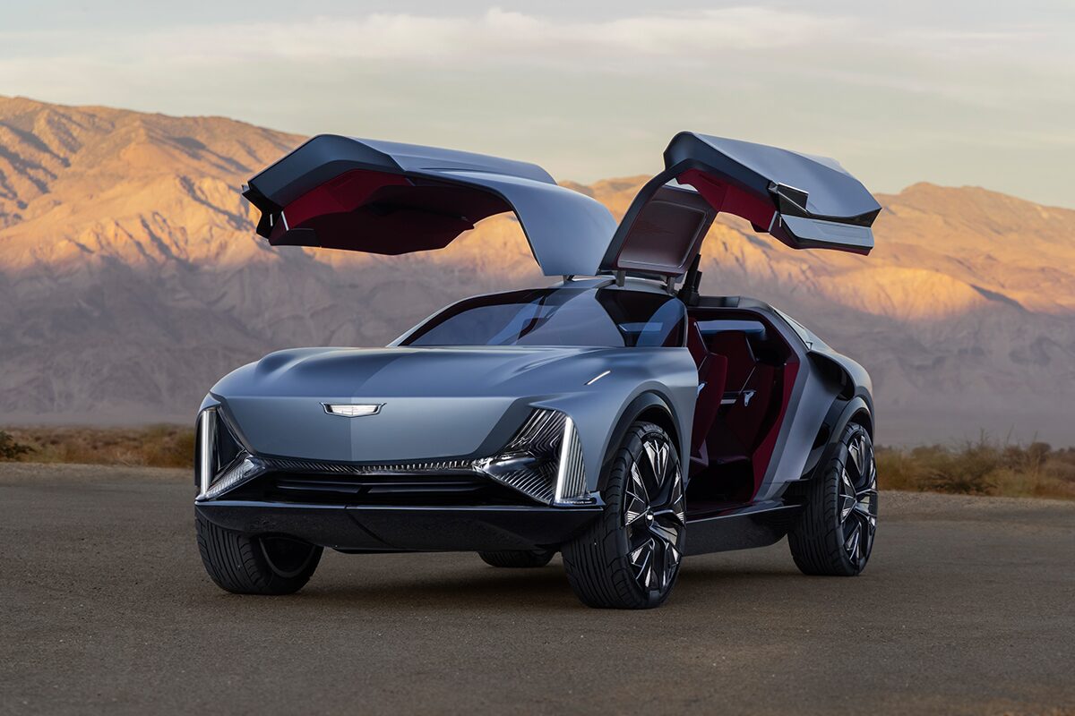 Three-quarter View of the Cadillac Elevated Velocity Concept Vehicle with the Butterfly Doors Open in the Desert