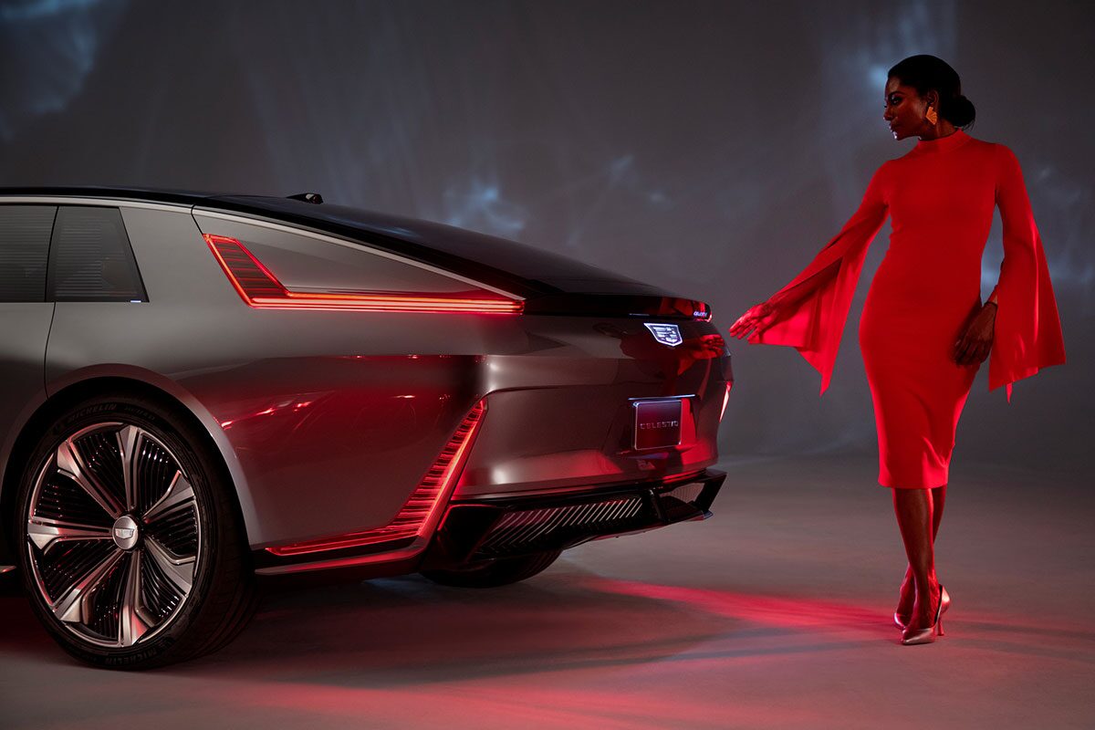 Woman Walking Around Rear Of The Cadillac CELESTIQ