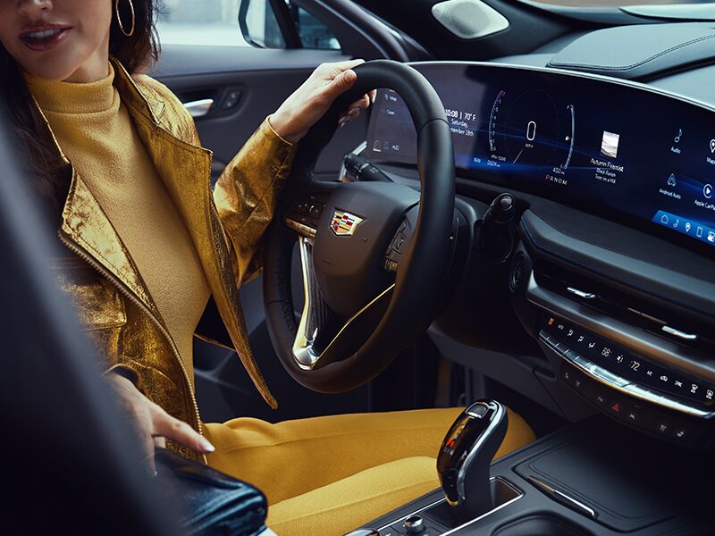 Passenger View of a Woman Driving the 2025 Cadillac XT4