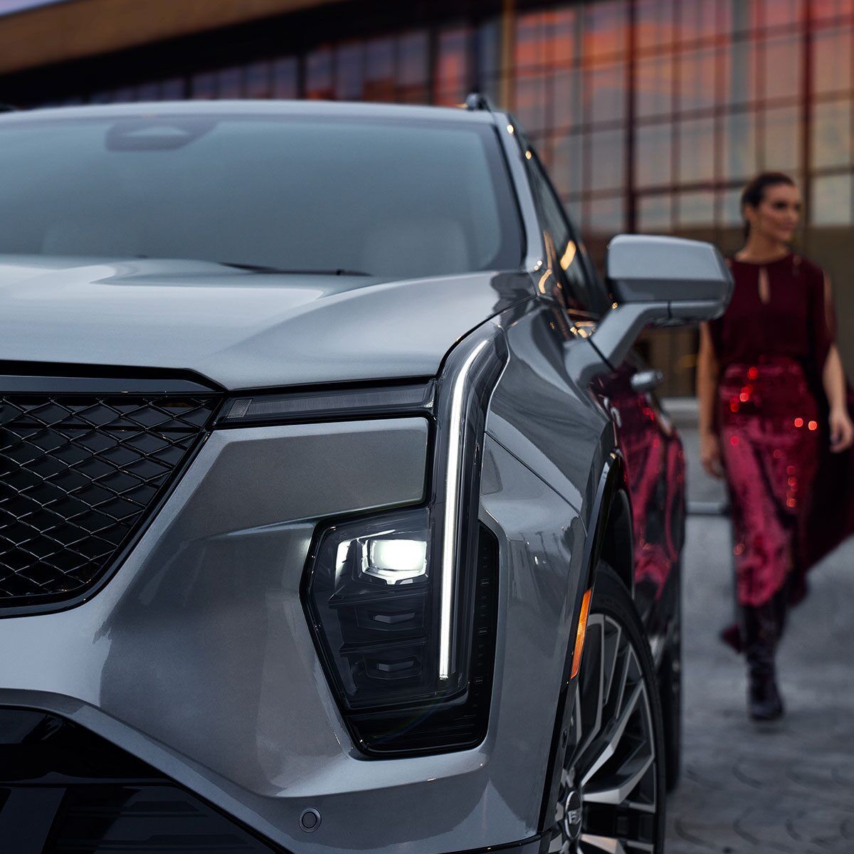 Close-up of the 2025 Cadillac XT5 Headlights on a Rooftop Loft in the City