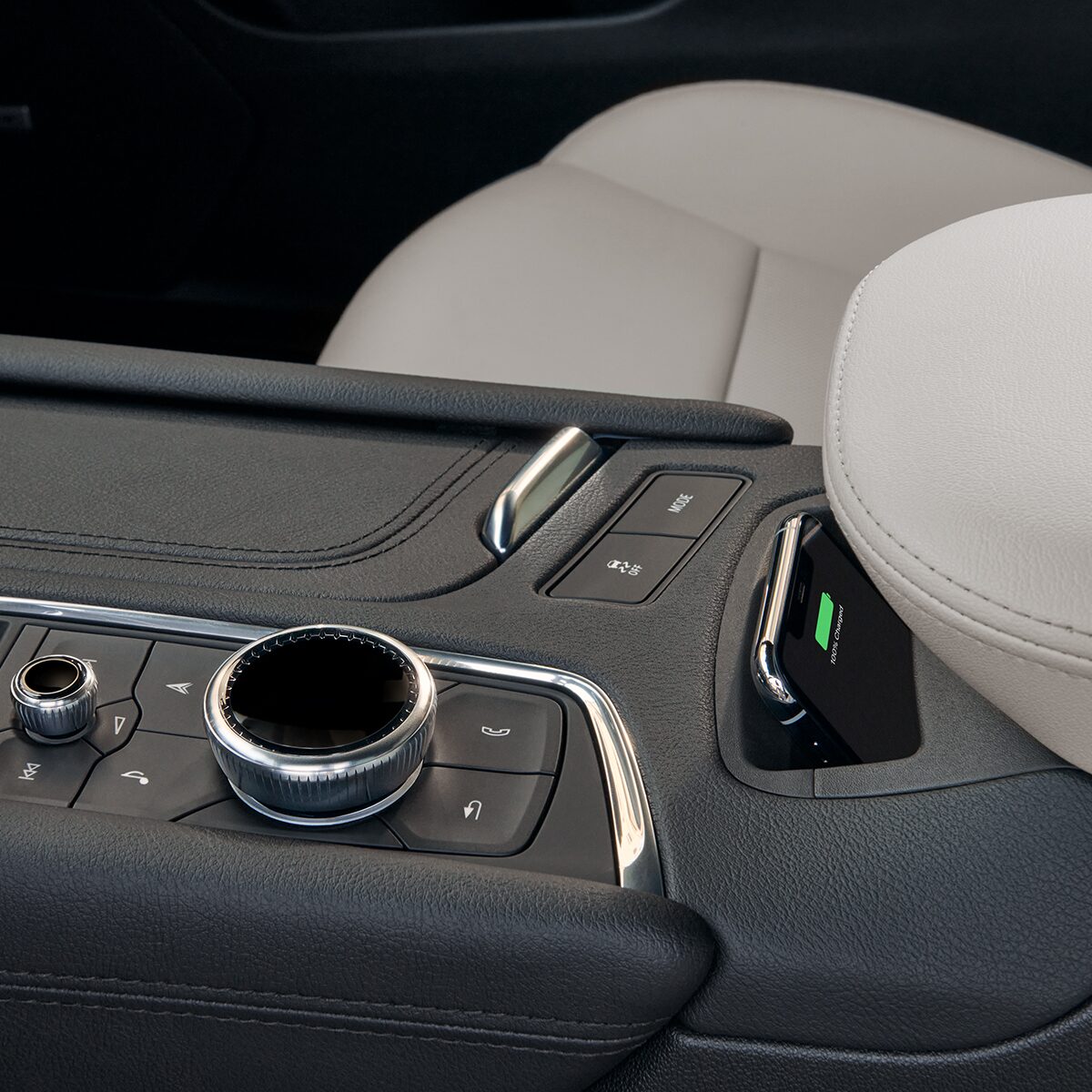 Cell Phone Utilizing the Wireless Phone Charger of the New Cadillac XT5