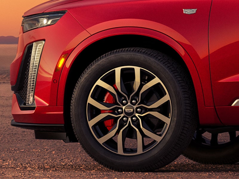 Driver's Side View of 2025 Cadillac XT6 Impressive Wheels and Red Calipers