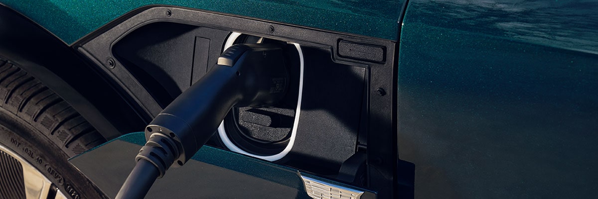 Close-up of a Charing Cord in the 2025 Cadillac LYRIQ Charger's Port