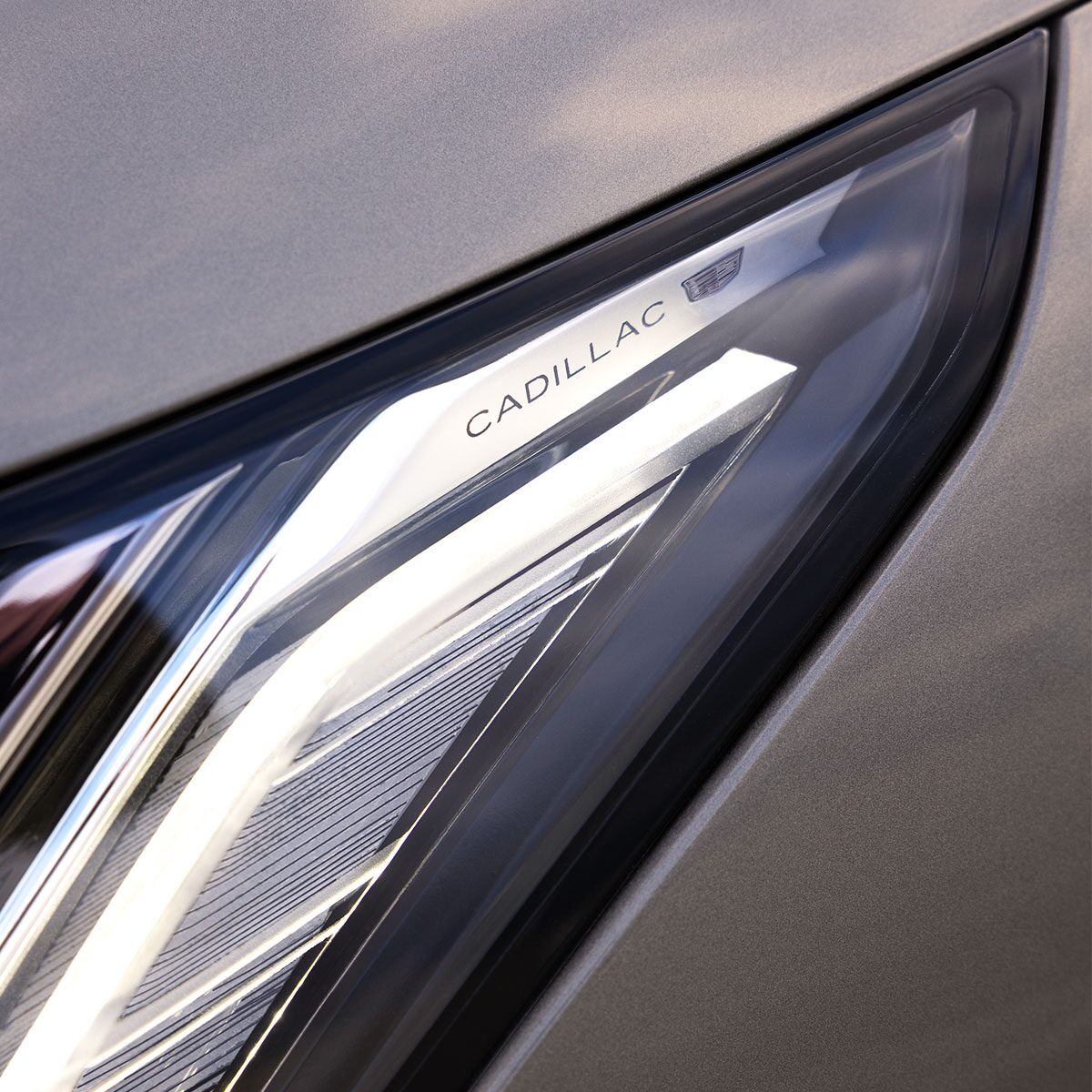 The Cadillac Logo Accent on the 2025 OPTIQ Exterior Headlamps