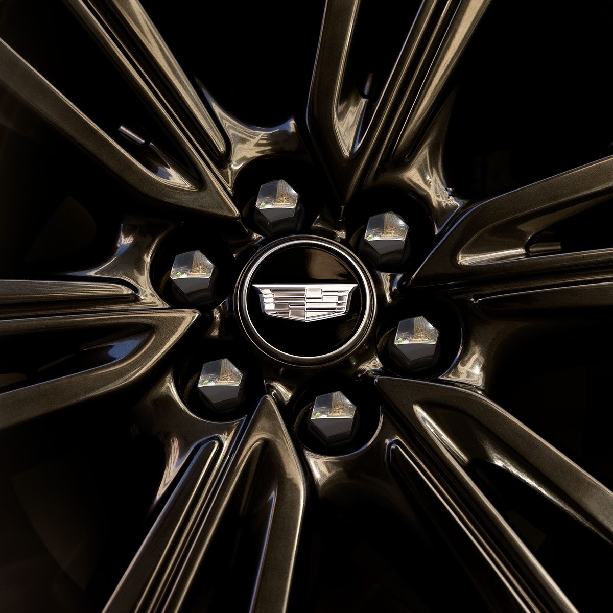 The Cadillac Logo on the Center of the 2025 Cadillac OPTIQ Tire Rim