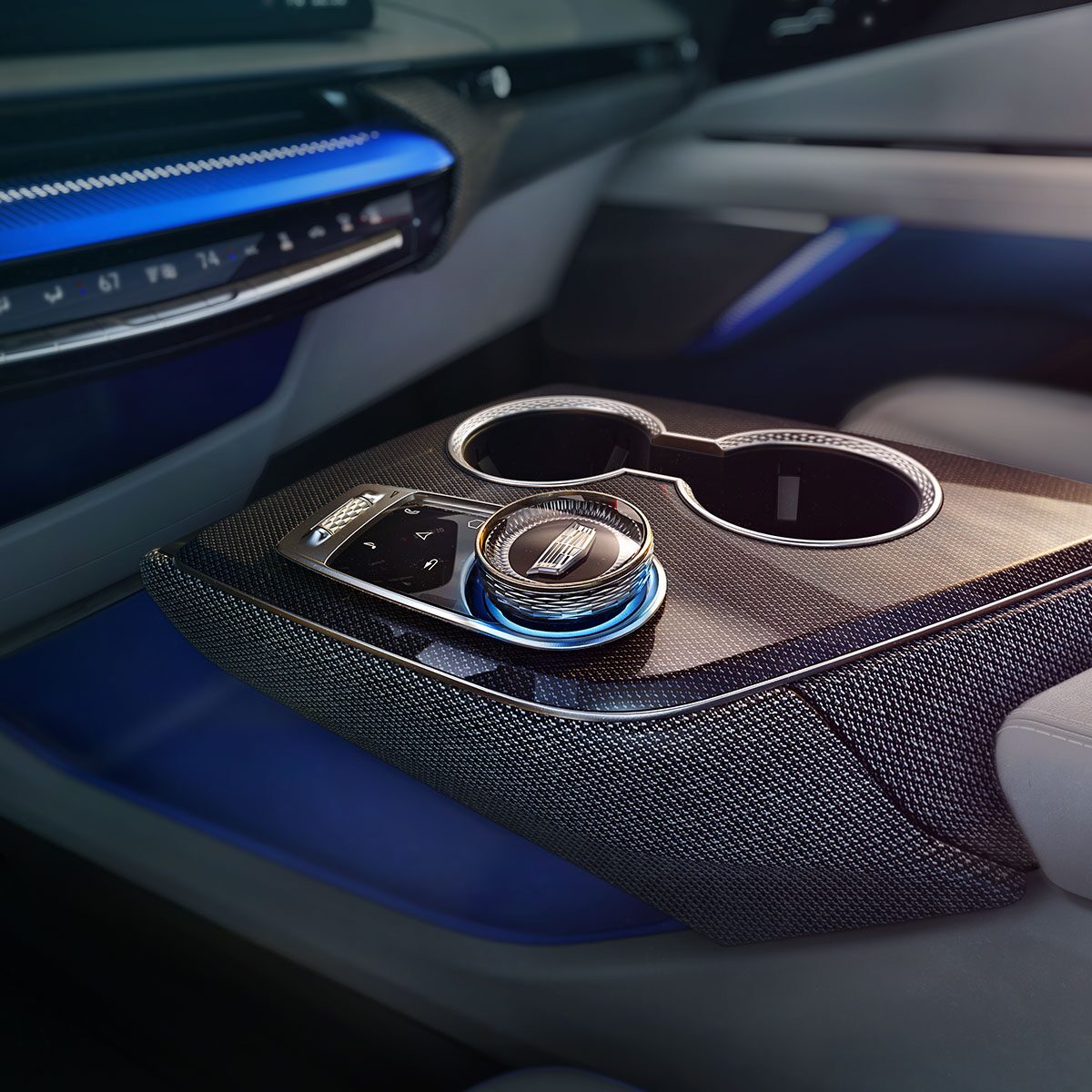 Close-up View of the 2025 Cadillac OPTIQ Sleek Center Console and Control Knob