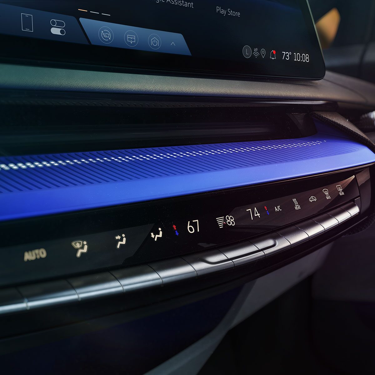 Close-up View of the 2025 Cadillac OPTIQ Vibrant Colors Near Climate Controls