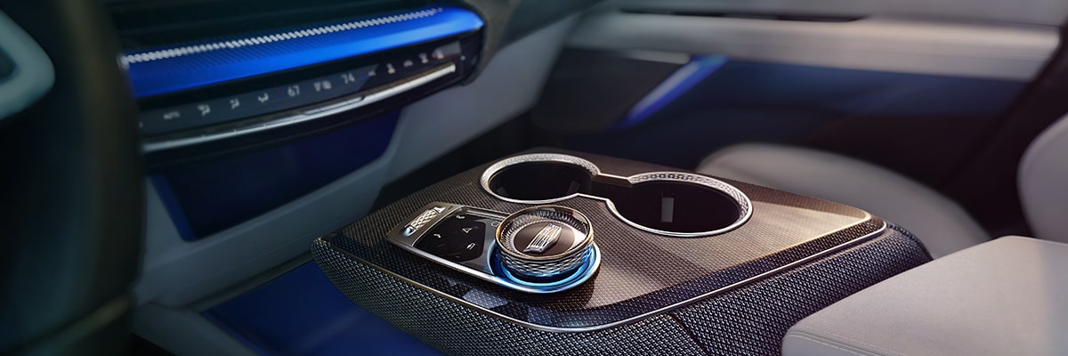 Close-up View of the 2025 Cadillac OPTIQ Sleek Center Console and Control Knob