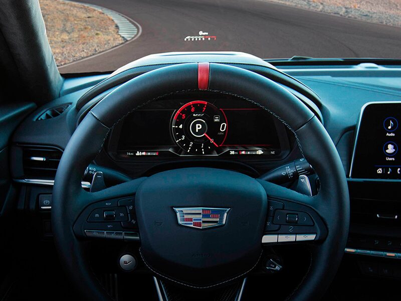 Close-up View of a 2025 CT4-V Steering Wheel and HUD on the Windshield