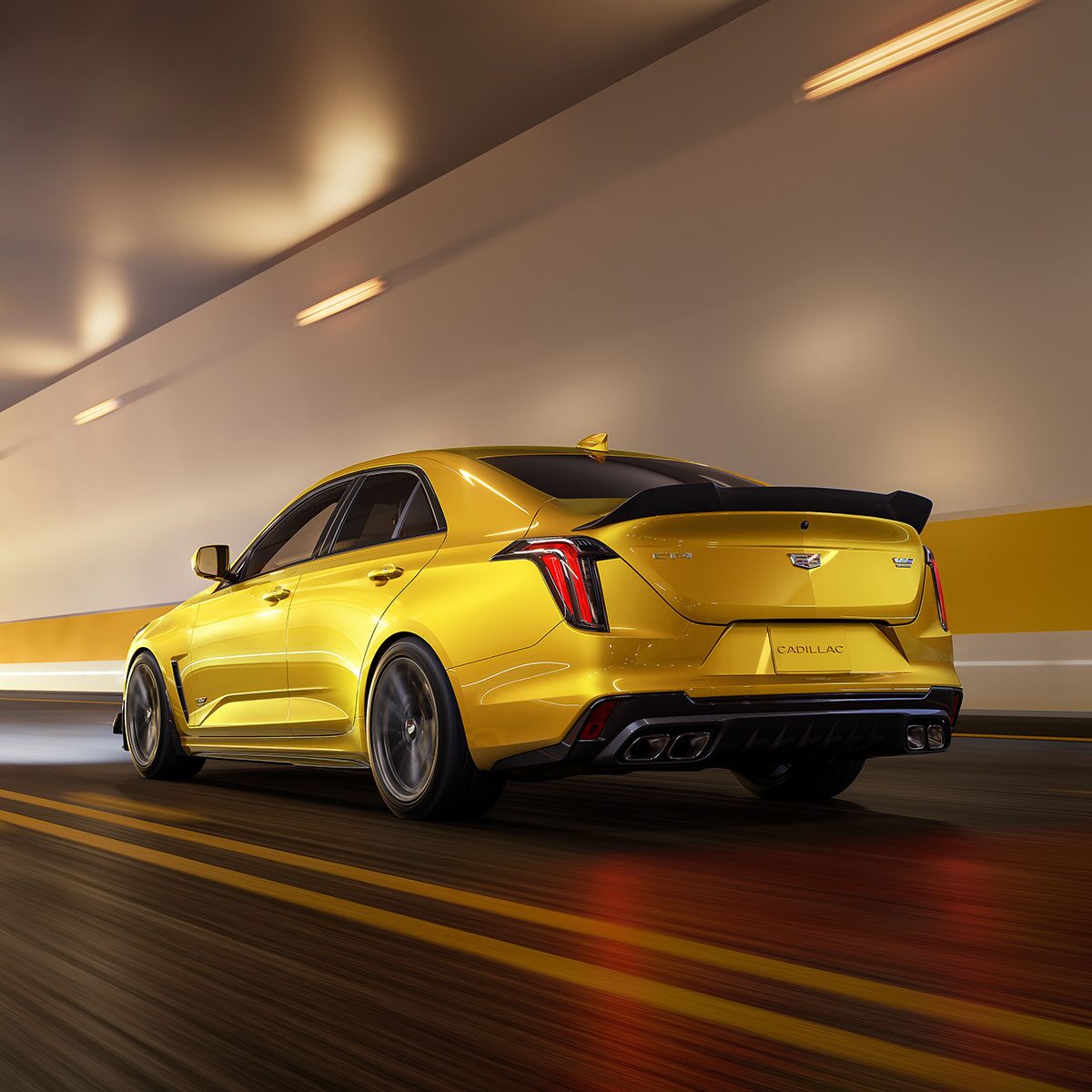 Rear View of a Yellow 2025 CT4-V Driving Through a Tunnel