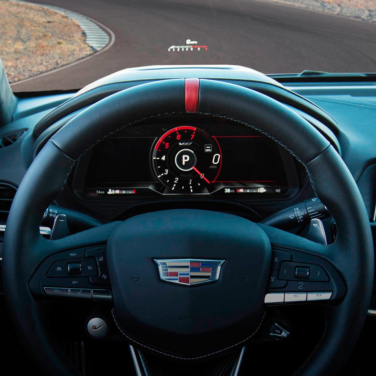 Close-up View of a 2025 CT4-V Steering Wheel and HUD on the Windshield