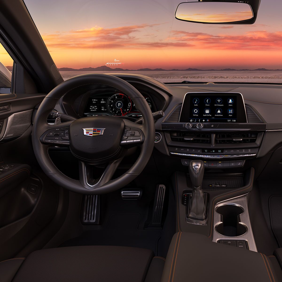 Driver's View of the 2026 CT4 Front Cabin Outlooking a Beautiful Sunset