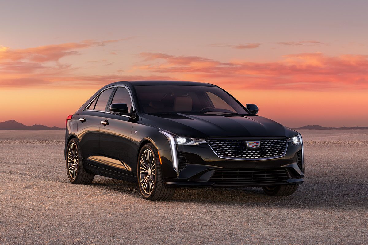 Three Quarters Front View of a Black 2026 CT4 Parked in the Open Desert