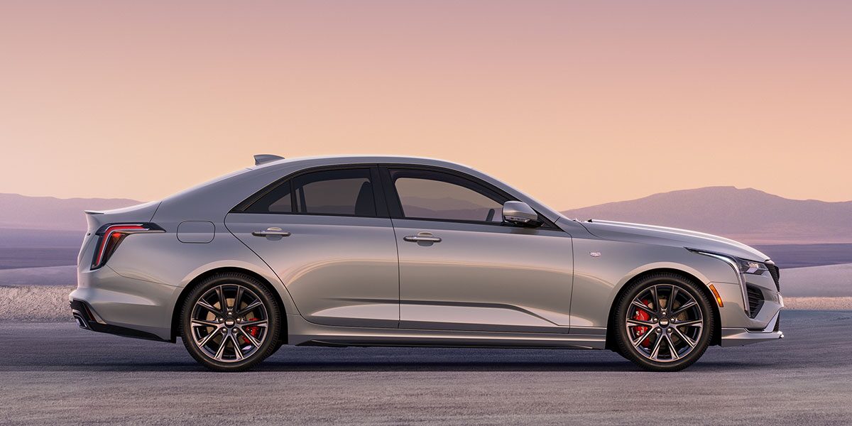 Side Profile View of a Silver 2026 CT4 Parked in the Open Desert