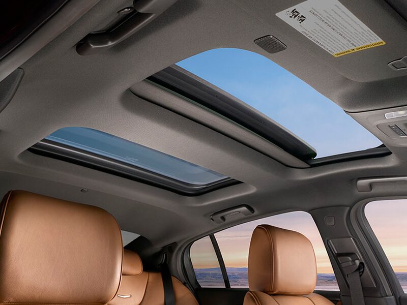 Passenger Seat View Looking up at the Opened Sunroof in a 2025 Cadillac CT5-V
