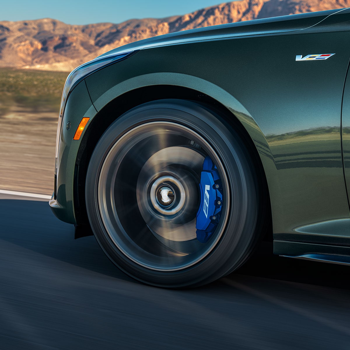 Low Angle View of a Front Tire Of a 2025 Cadillac CT5-V Driving Down the Road