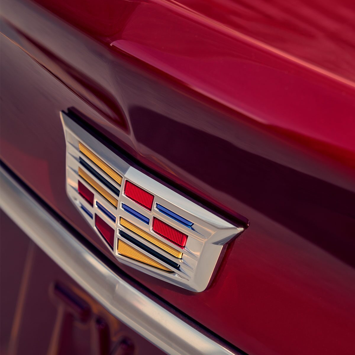 Close-Up View of Cadillac Crest Above 2025 CT5 Trunk License Plate
