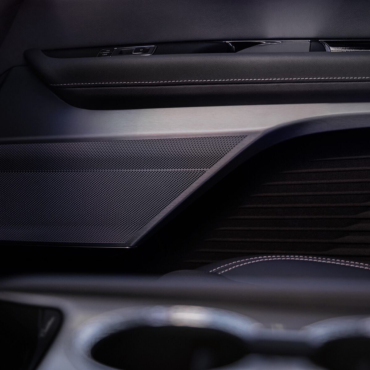 Close-up of the 2026 VISTIQ All-black Passenger Door Details and Speaker