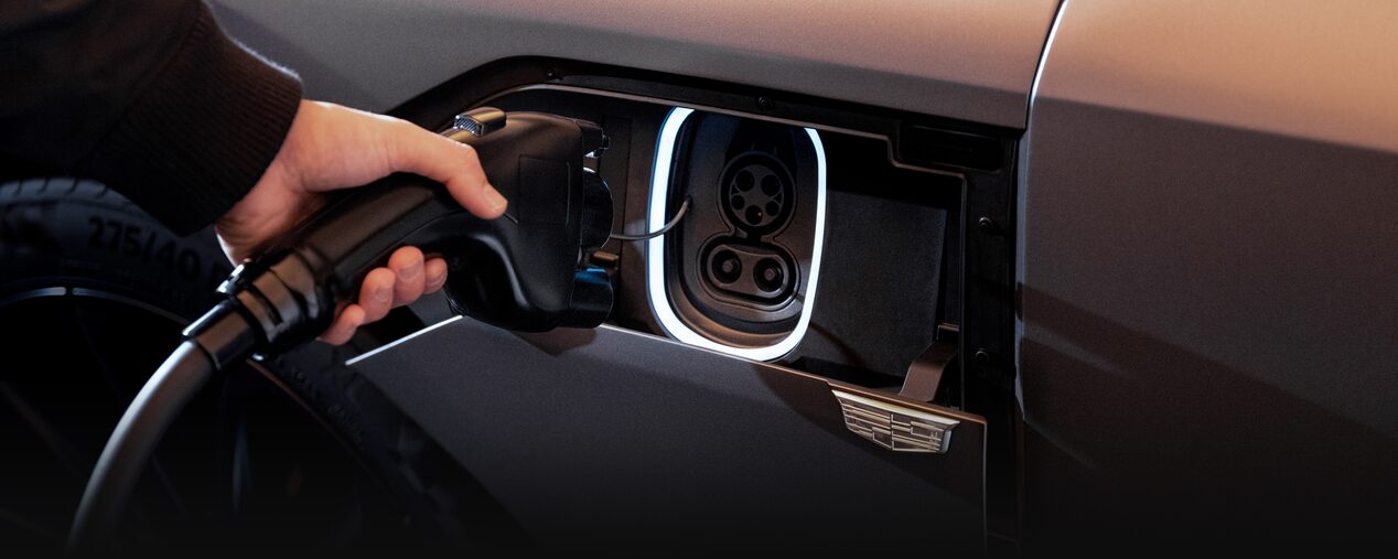 Close-up of Someone Inserting the Charger in a 2026 LYRIQ-V Charging Port