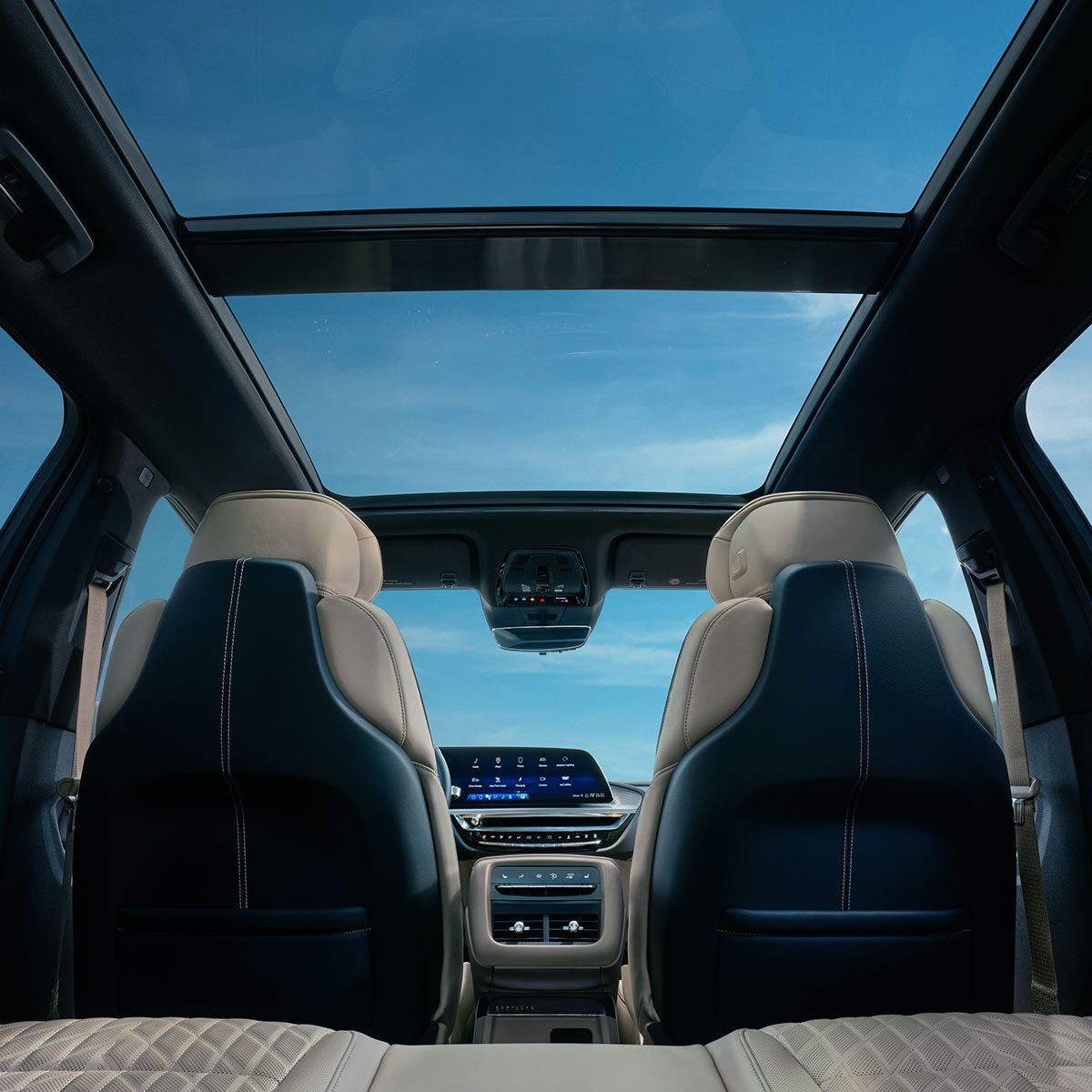Back Seat View of the All-electric Cadillac LYRIQ Front Row and Panoramic Sunroof