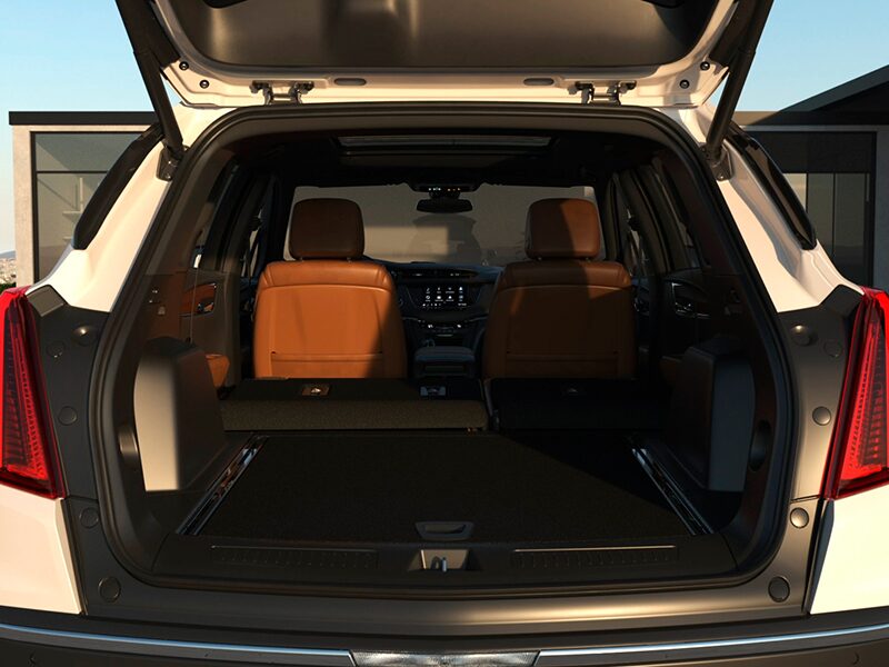 Luggage Organized in Spacious Trunk Cargo Space in the Interior of The Cadillac XT5