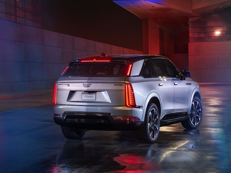 Rear Profile Shot of the 2025 Cadillac ESCALADE IQ Parked During a Sunset