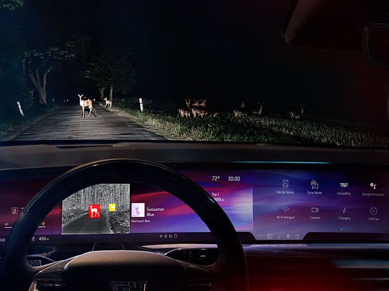 Driver Seat View of the 2026 ESCALADE IQL Dashboard Displaying the Night Vision Feature While Driving at Night